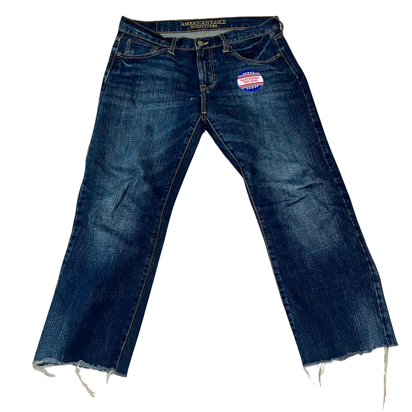 One-of-a-kind SMC jeans titled “Make America Kind,” featuring a raw hem and a red, white, and blue embroidered patch that reimagines political messaging with a softer, more human ethos.